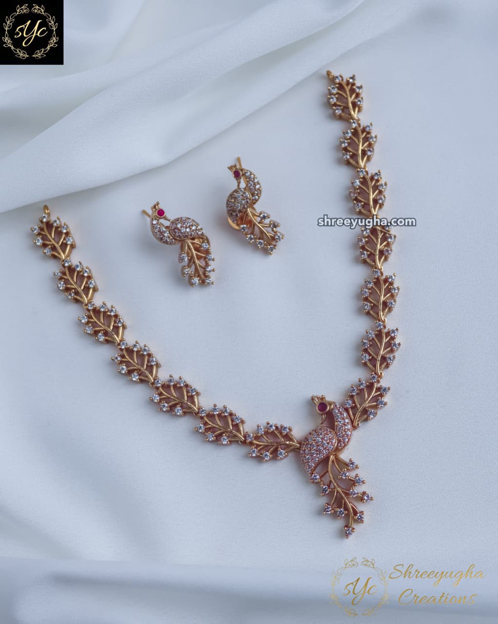 Dazzling peacock diamond necklace with earrings