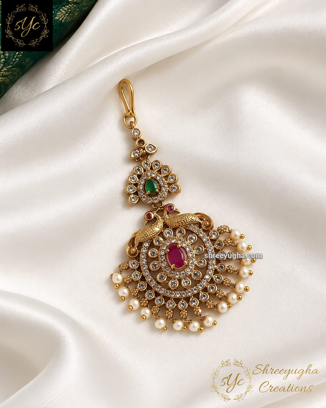 Ruby emerald twin peacock tikka