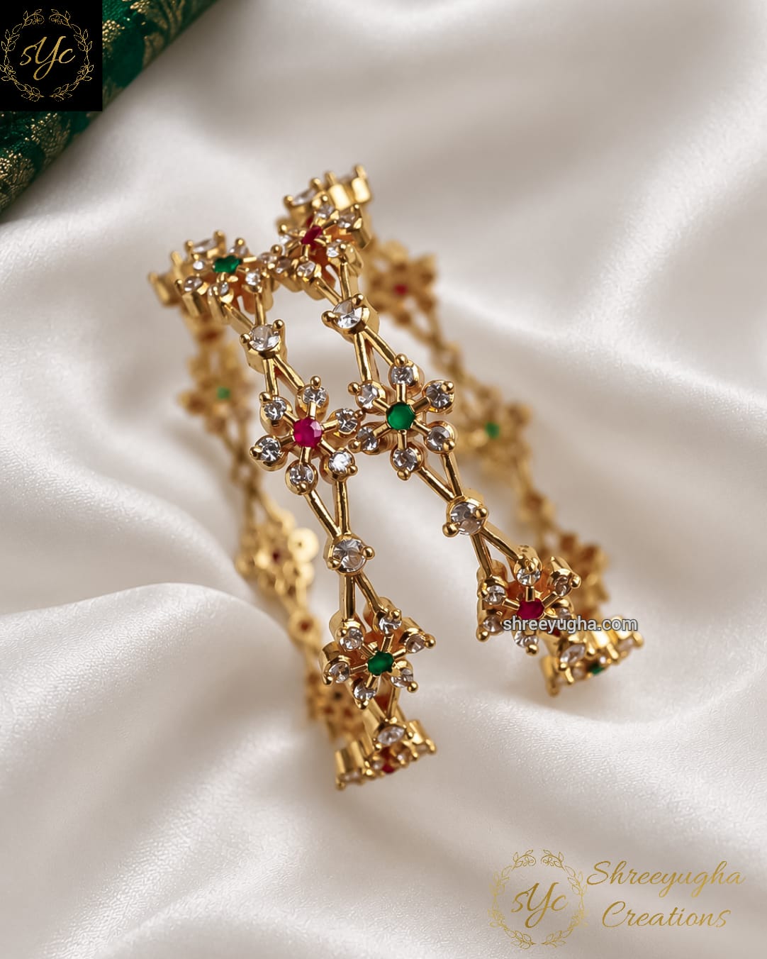 Diamond bangles with ruby emerald