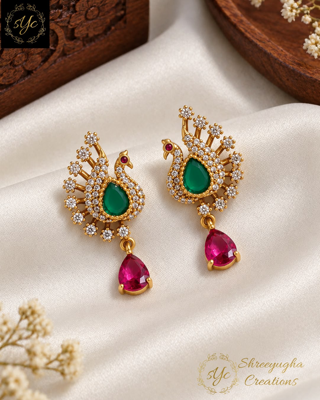 Vadivu peacock earrings.