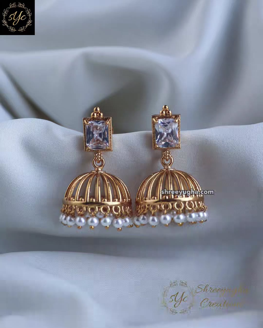 Precious stone gold jhumkas
