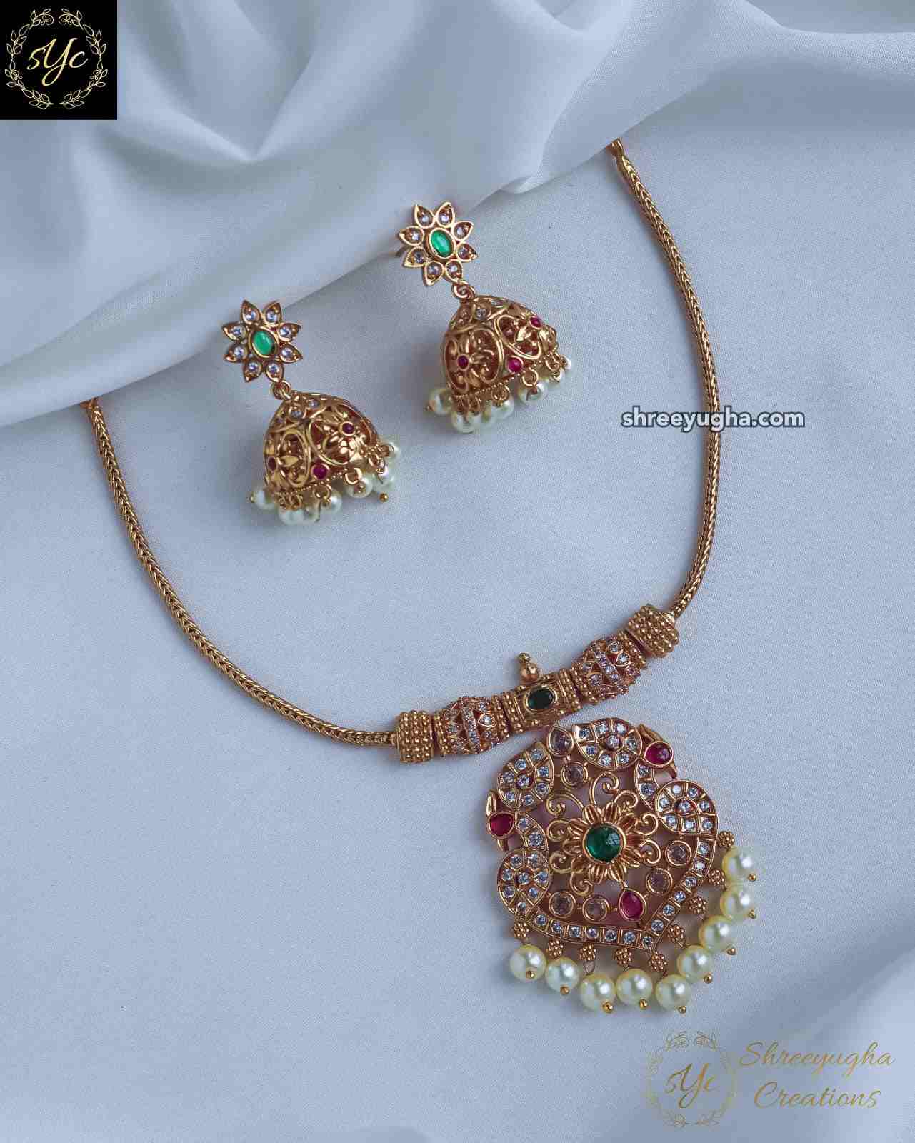 Peacock pendant chain with jhumkas