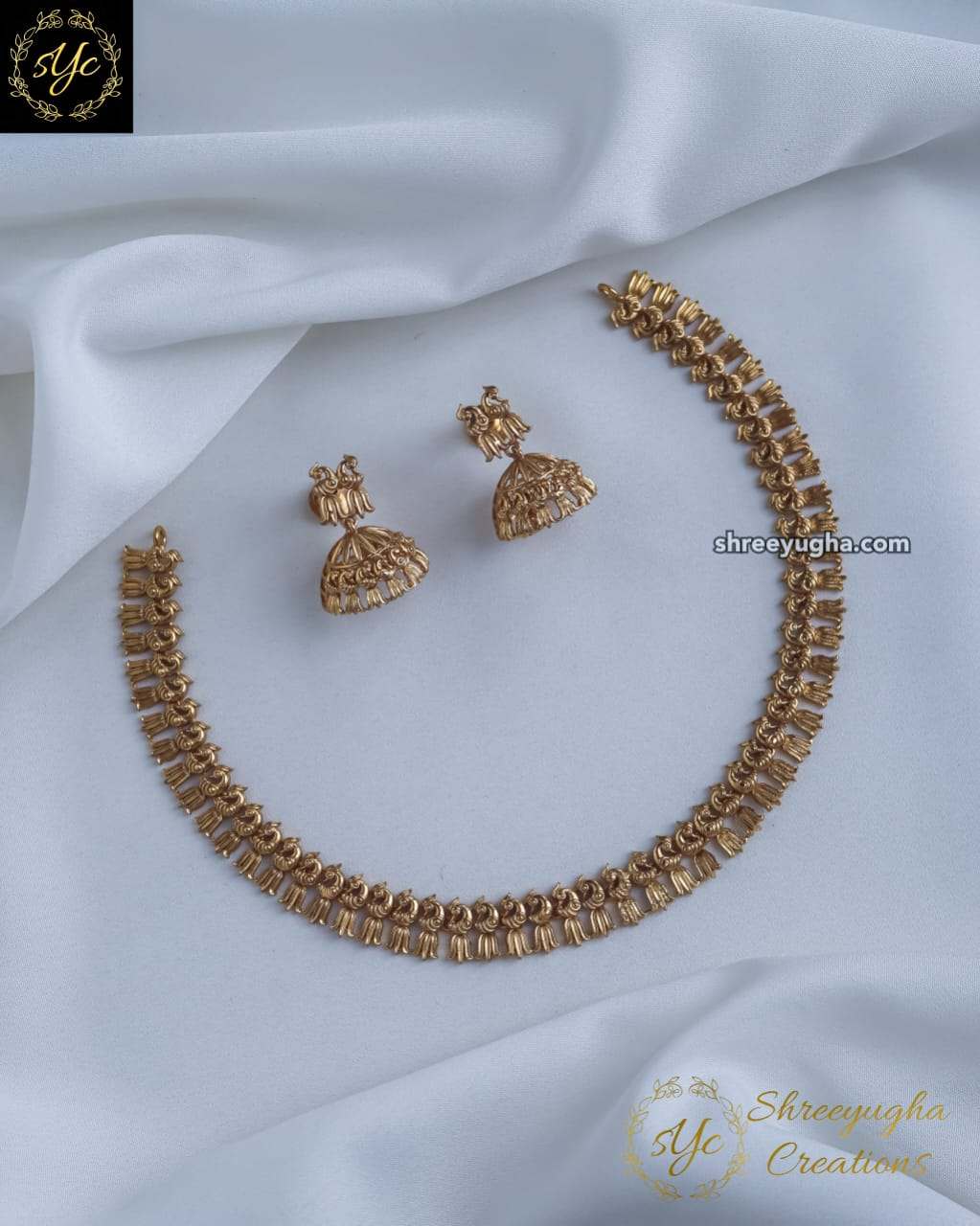 Tradition peacock necklace with jhumkas