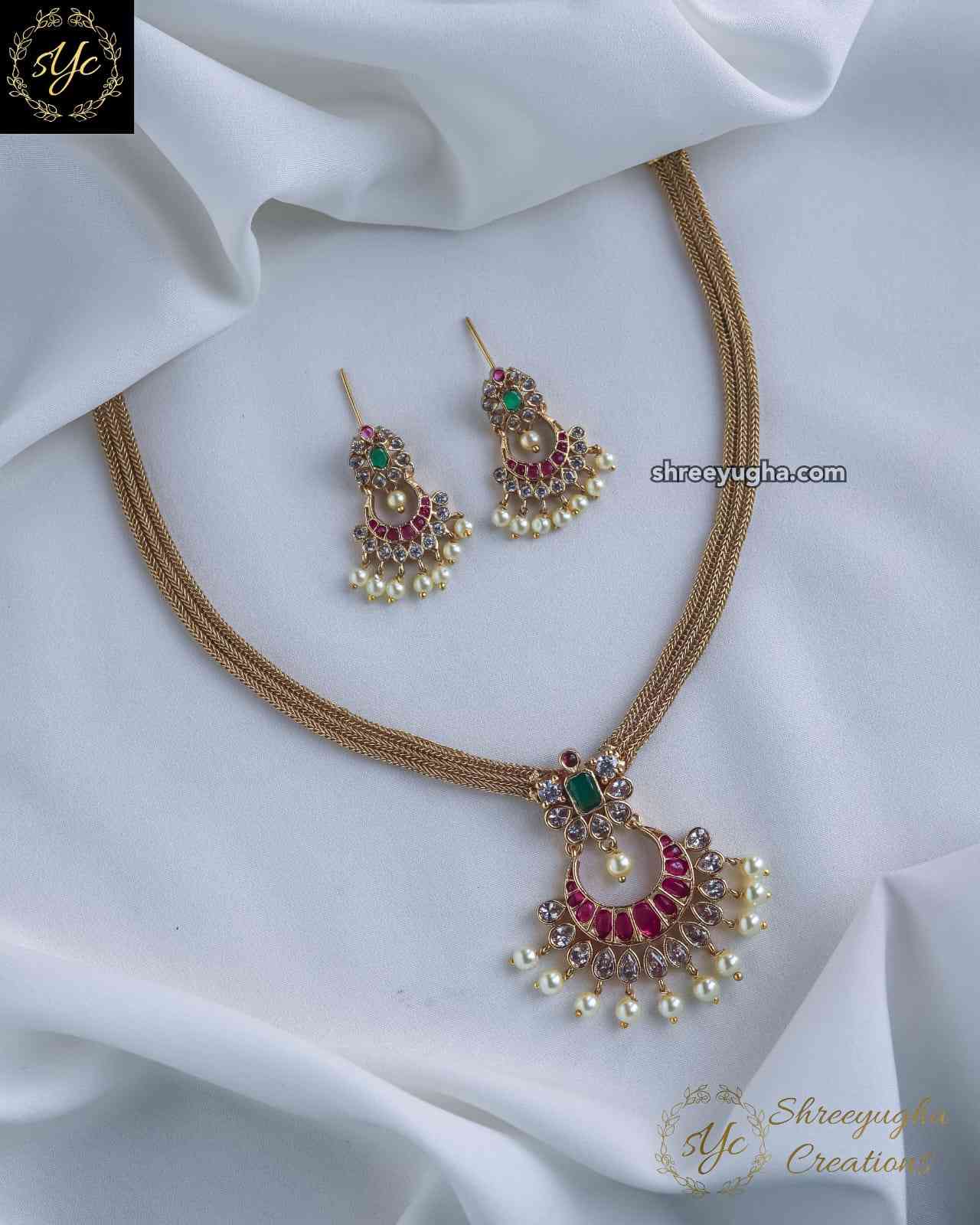 Traditional diamond necklace with earrings