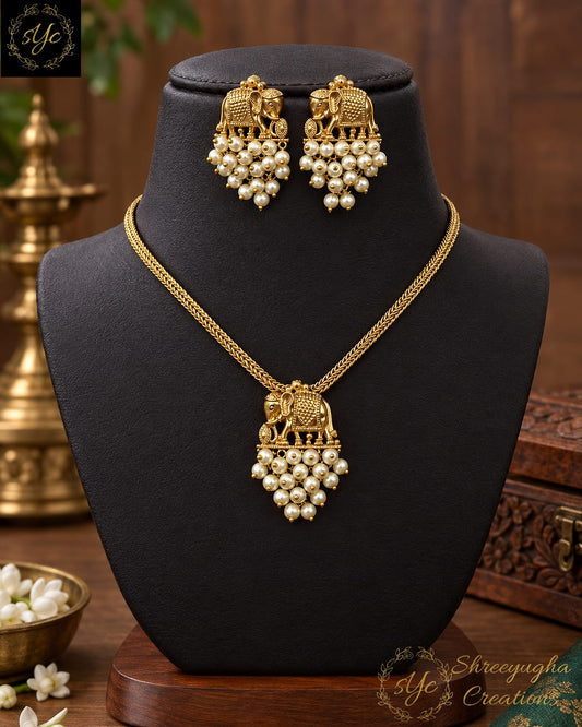 Temple necklace with elephant motif