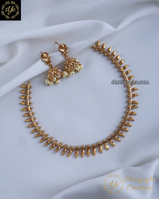 Traditional gold leaf necklace with jhumkas